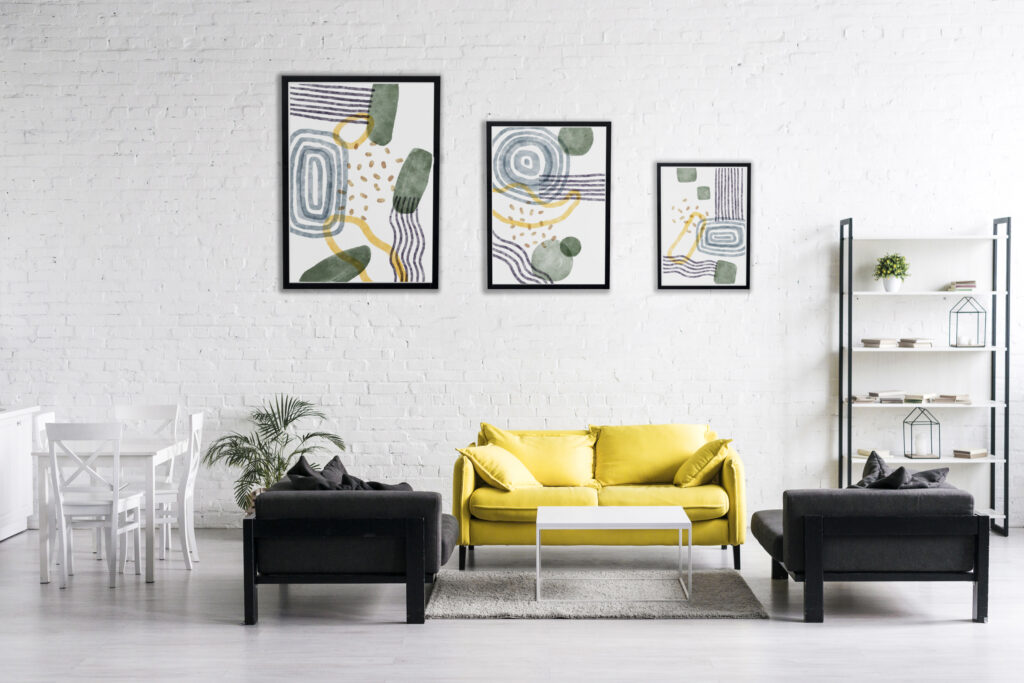 interior design with photoframes yellow couch