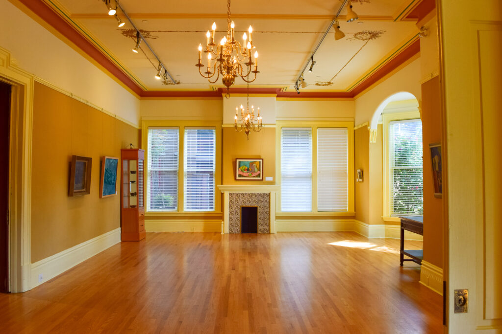 wide angle shot interior building including pictures chandelier doors